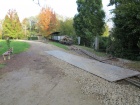 Die Bahnhofausfahrt Seite Brücke ist unter einer provisorischen Strasse verschwunden [28. Oktober 2014]